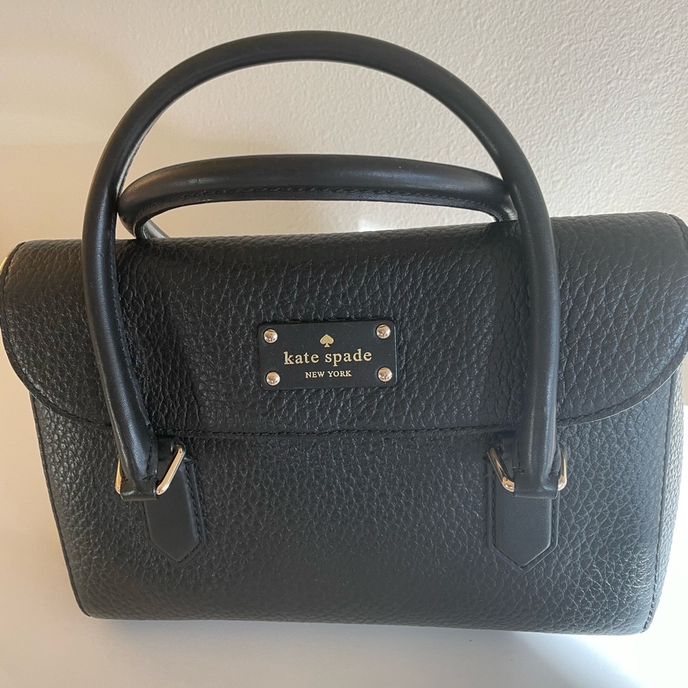 Kate Spade Black Satchel with Structured Shape and Flap Closure